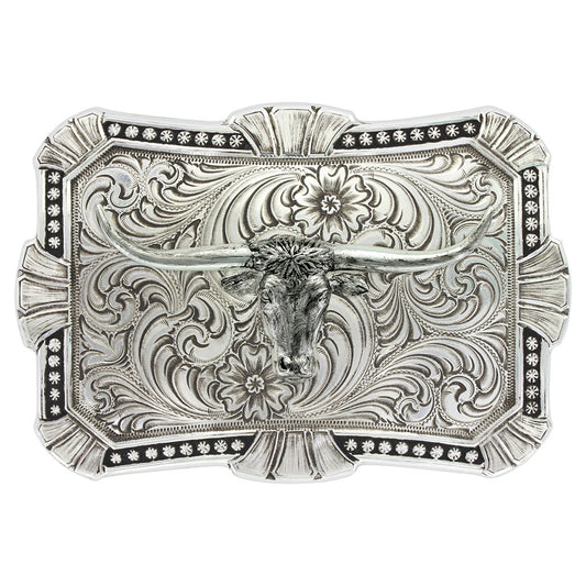 An ornate silver-toned belt buckle featuring a carved longhorn steer design with floral scrollwork and black oxidized detailing, shown on a plain white background.