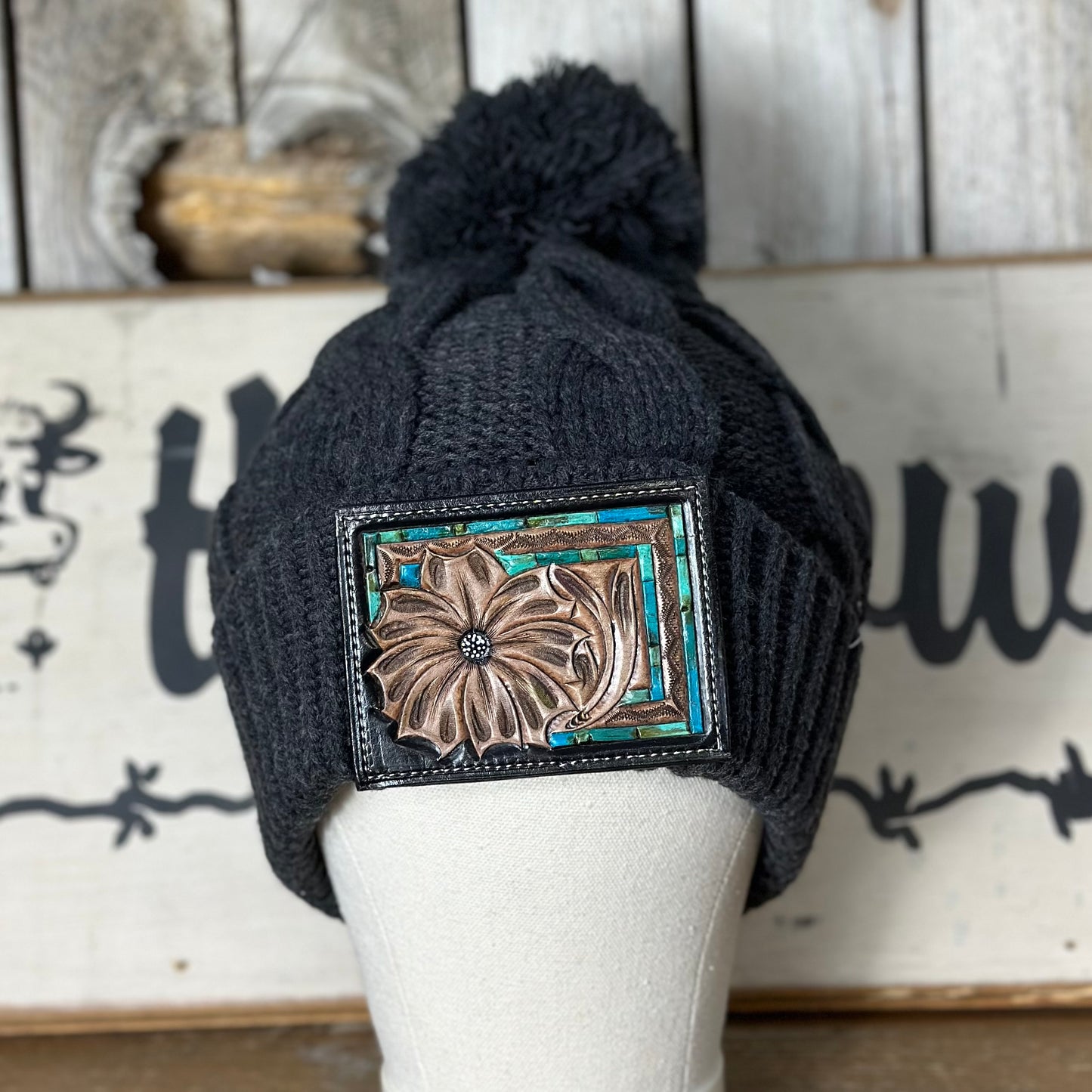 Amanda Rose Chunky Cable Knit Beanie w/ Pom and Hand Tooled Patch