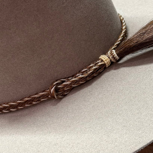 Tassel shown on hat with horsehair