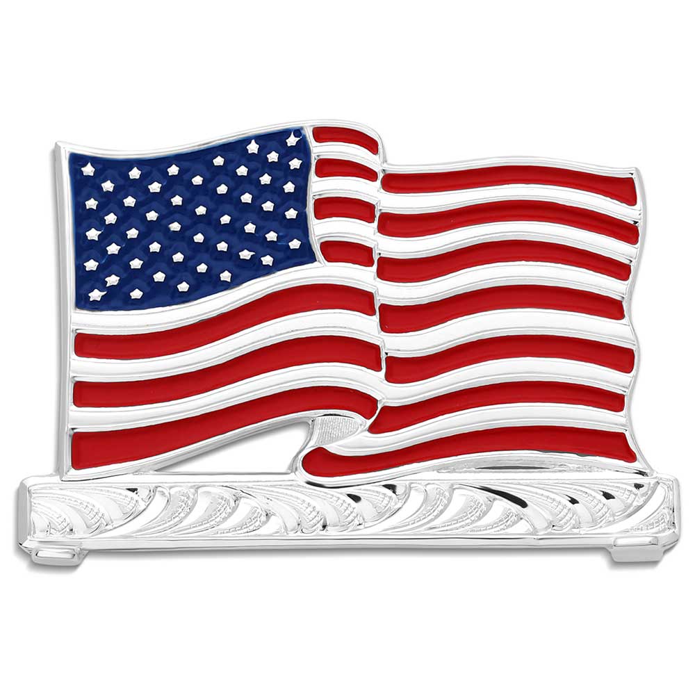A metal hat flag with a silver plating over a brass base, featuring the American flag design with red and blue stripes and a bar with silver engravings beneath the flag.